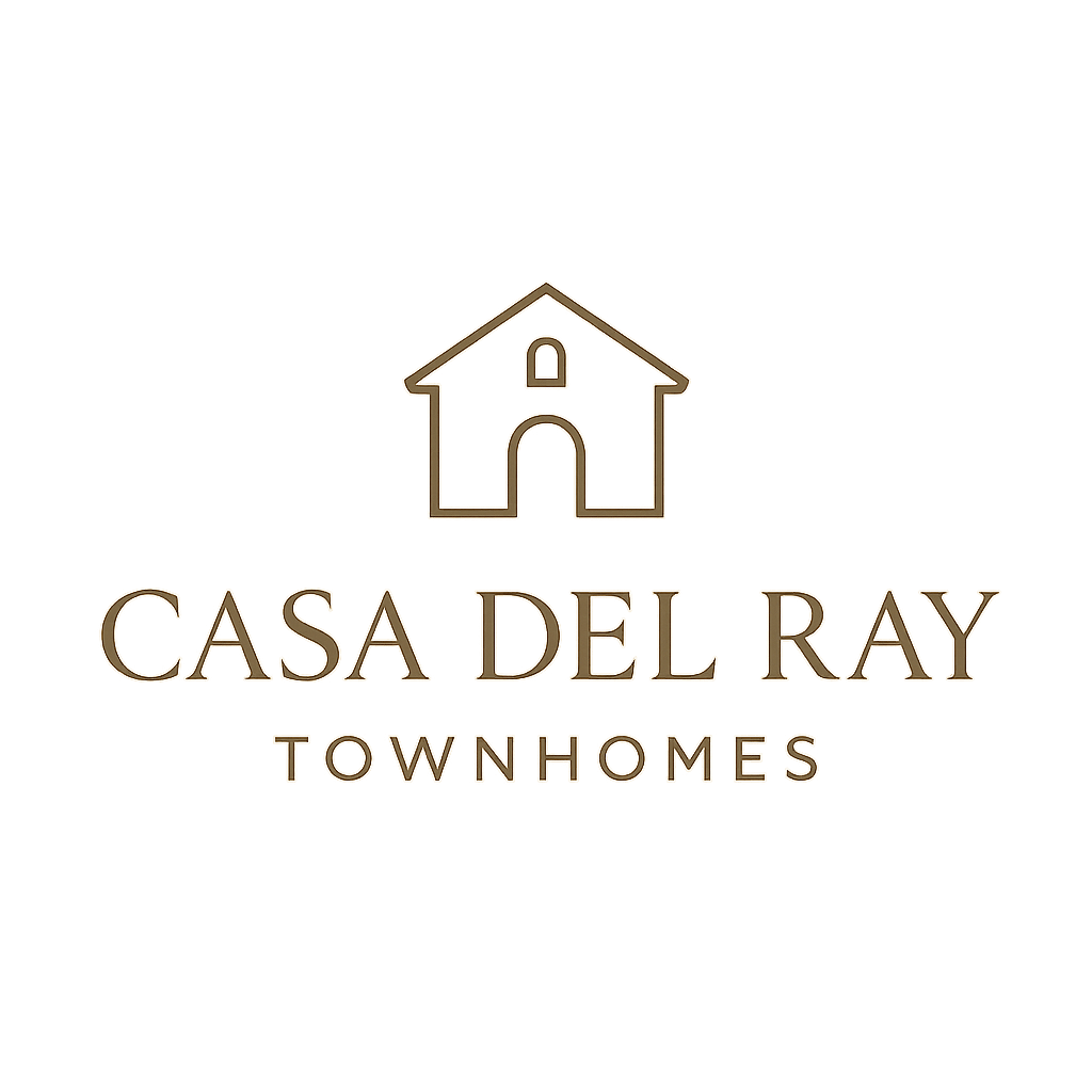A logo with a house shape and the words "CASA DEL RAY TOWNHOMES" written below it.